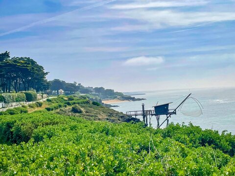 Traditional French fishing hut with net on the scenic Atlantic coast near Pornic, France