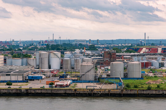 Panoramic view of industrial chemical and oil storage tank terminal at port harbor, energy sector and petroleum logistics concept