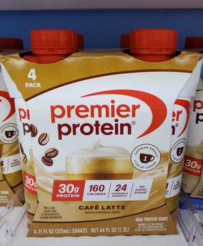 Wilmington, Delaware, U.S.A - Aug 7, 2026 - Premier Protein Cafe Latte pack showing high-protein shakes with vitamins, minerals, caffeine equivalent to one coffee cup.