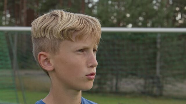 Portrait of a young boy gets interviewed