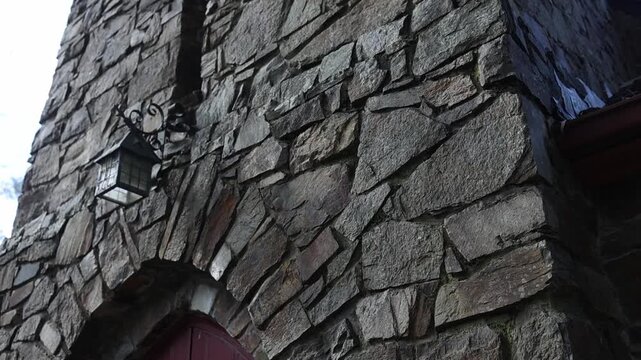 Low angle view of a historic stone tower wall