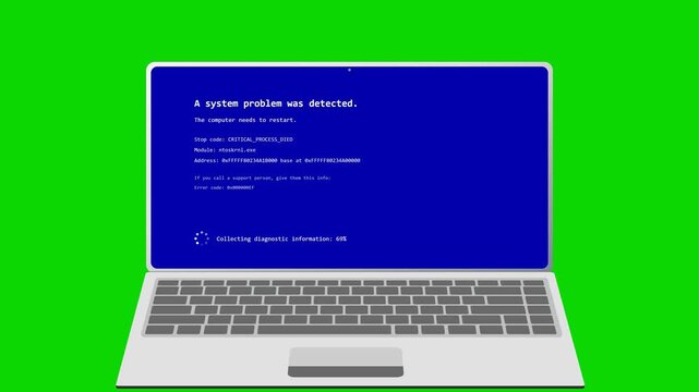 Laptop experiencing system crash and restart on green screen. 4K Video