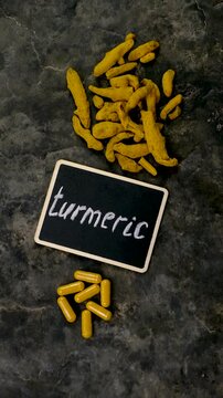 Turmeric root for supplements and essential oils. Selective focus.