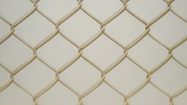 Wire chain link fence mesh pattern texture isolated white background