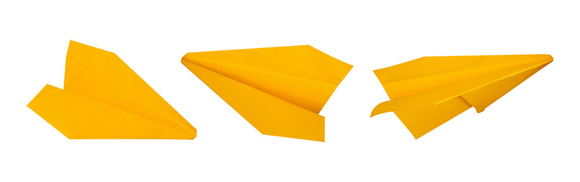collection of yellow origami plane isolated on white background