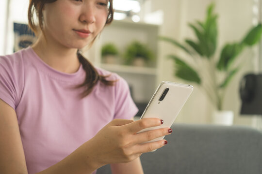 Young Asian Woman Working Online, Relaxing and Practicing Self Care During Daily Life at Home