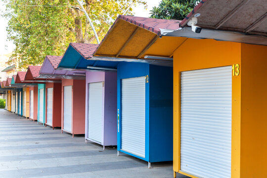 The brightly coloured street stalls are closed outside business hours.