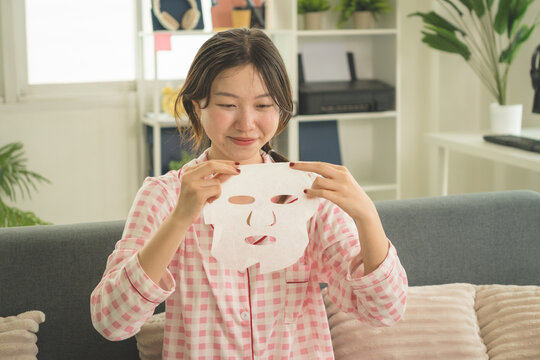 Young Asian Woman Working Online, Relaxing and Practicing Self Care During Daily Life at Home