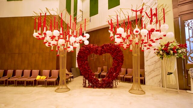 Elegant Wedding Stage Decor with Heart Shaped Flower Arch and Decorative Trees in Delhi NCR