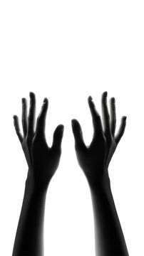 Backlit silhouette of two raised human hands with long shadows isolated on transparent background