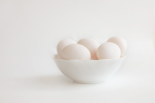 Chicken eggs, close‑up, on a white background.