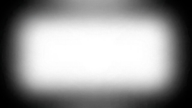 Abstract white light glow with dark vignette edges and film grain texture background