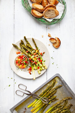 Roasted green asparagus salad with salsa and crostini
