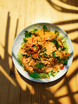 Raw vegetable salad with peanut sauce