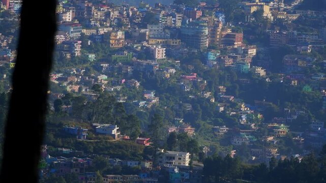 Right To Left Pan Over Dense Colorful Hillside Settlement Of Almora City