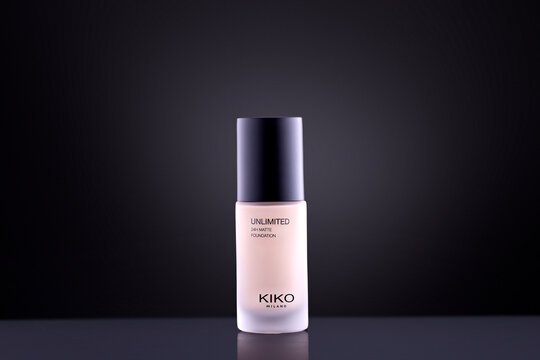 KIKO Milano Unlimited 24H Matte Foundation Cosmetic Bottle on Dark Background