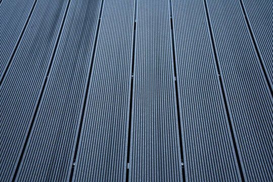 Grey wpc floor close up shot for industrial background.