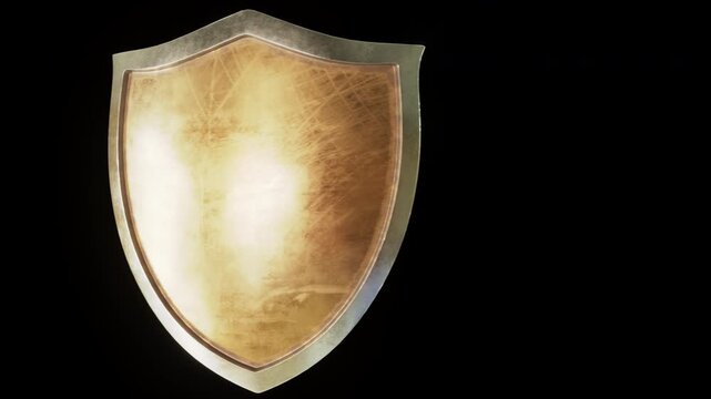 Cyber security shield spinning on a black background in three colors: blue, gold, red. Includes a luma matte. Network protection, antivirus software, data privacy, network hack. CG animation.