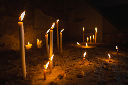 A group of small burning candles
