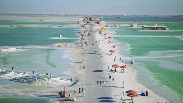 Aerial View of Ten-Thousand-Zhang Salt Bridge in Qarhan Salt Lake: Pure Emerald Water, White Salt Causeway and Sunlight in Qinghai
