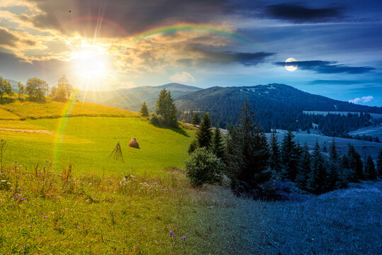 countryside mountain landscape in summer. day meet night. sun and moon over view of Borzhava mountain ridge behind the green pasture at twilight. field near coniferous forest. astrology wallpaper