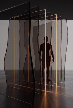 Silhouette standing among dense vertical 3D light strands