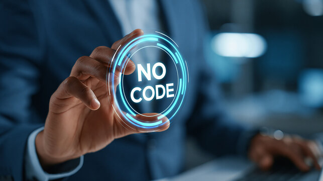 Close-up of hand using virtual touch screen pressing no code inscription, low coding developing application concept, defocused background, with copy space