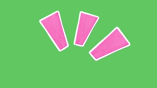 Animated scrapbook pink paper cutout sticker fluttering on green screen
