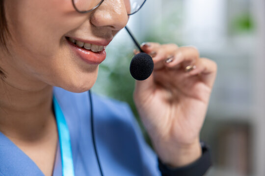 Headset microphone woman smile eyeglass operator, close up of friendly professional speaking, customer support and communication in modern office workspace