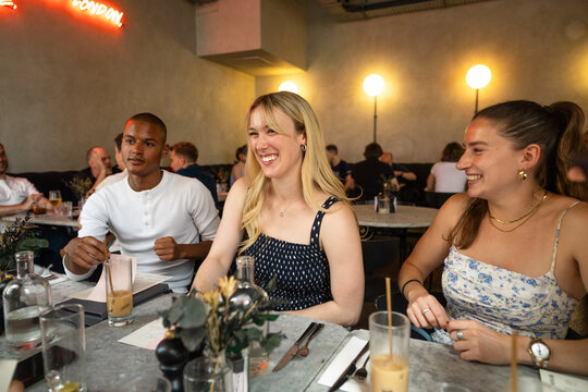 Friends enjoying dinner together