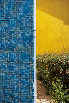 Bright Colors and Textures on a Building in a Garden Area