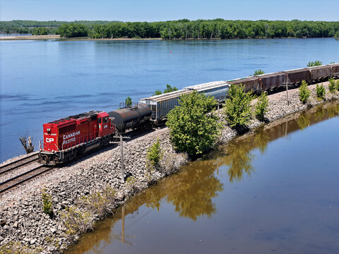 Savanna, Illinois May 11, 2026 Canadian Pacific 2326 Switching locomotive in bright red livery on mainline track along the Mississippi river.