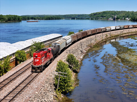 Savanna, Illinois May 11, 2026 Canadian Pacific 2326 Switching locomotive in bright red livery on mainline track along the Mississippi river.