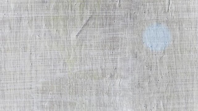 Seamless 4K looping vertical movement across a brushed gray metal surface with fine linear scratches. Suitable for industrial backgrounds modern design and motion graphics.