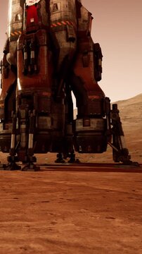 A rocket lander stands on the red soil of Mars. The sun sets in the background, casting orange light over the landscape. Dust rises from the lander&rsquo;s legs as it prepares for exploration.