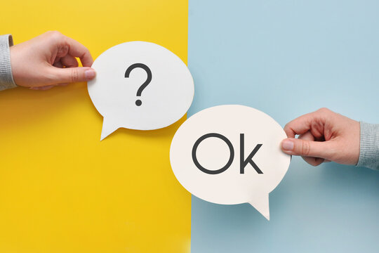 Question and OK speech bubbles. Decision approval and communication concept