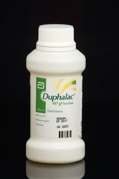 Photo Duphalac lactulose 200ml milli-litres medical anti-constipation medication isolated black background