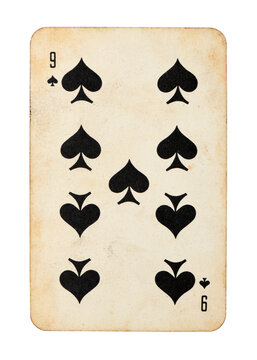 Old vintage Nine of Spades playing card isolated on white.