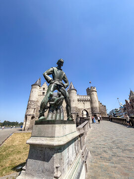 Antwerpen, Belgium, July 14, 2026 - Lange Wapper statue in front of Het Steen medieval castle in Antwerpen, Belgi&euml;