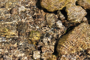 Abstrack stones, pebbles and water texture. © Mrk