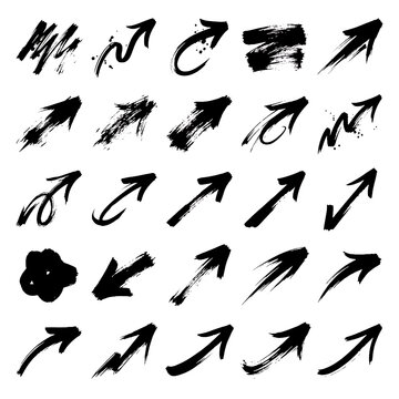 Collection of white brush stroke arrows against a black background presents dynamic directional indicators arrowhead direction pointing guidance movement motion trajectory vector brushstroke