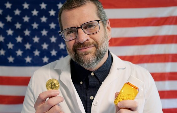 Pharmacist in lab coat holding prescription pill bottle, cash, and crypto against an American flag, symbolizing the influence of money on US medicine