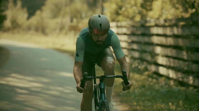 Cyclist Riding Road Bicycle Fast Along Rural Path. Sports Training 