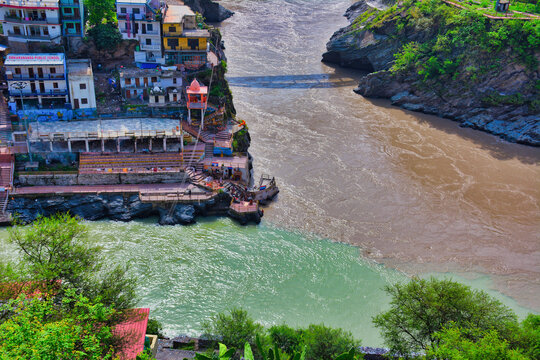 Scenic View of Devprayag River Confluence Surrounded by Himalayan Villages and Green Mountains