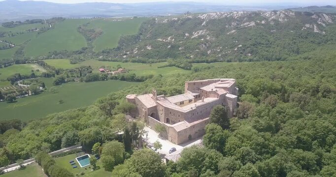 Val d'Orcia, Tuscany, Italy, aerial drone view, winding road with cypresses