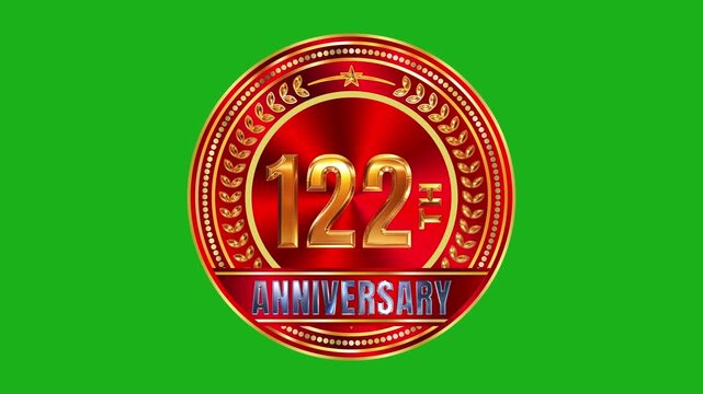 Radiant 122nd anniversary gold badge rendered on ruby red metallic background with focused accent lighting 4k video