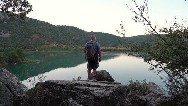 Hiker in the rock looking the landscape