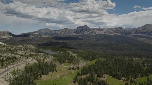 An aerial shot of Mirror Lake hwy and the Uintah mountains at mid day in Summer, Utah, USA