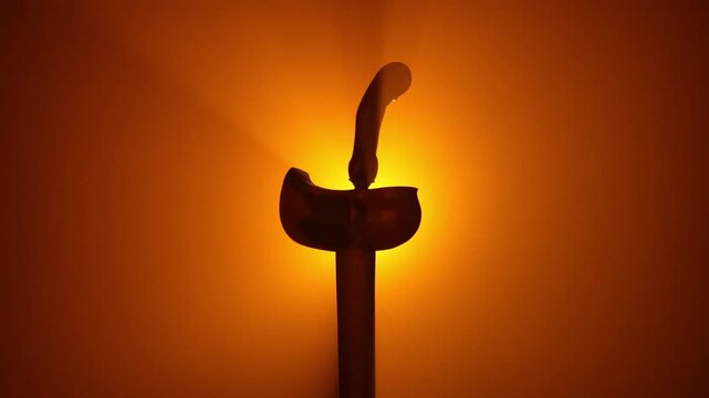Kris Indonesia Cultural Heritage, Javanese Keris Dagger Sheath Silhouette in Warm Backlight