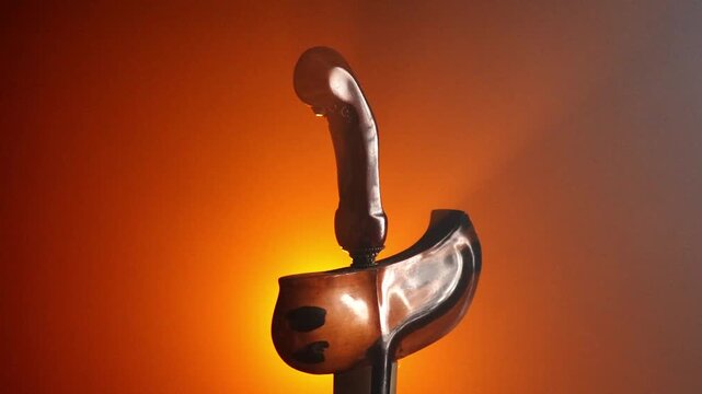 Kris Indonesia Cultural Heritage, Javanese Keris Dagger Sheath Silhouette in Warm Backlight